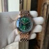 Breitling Navitimer GMT Automatic GMT 41mm Green Dial Rose Gold R32310